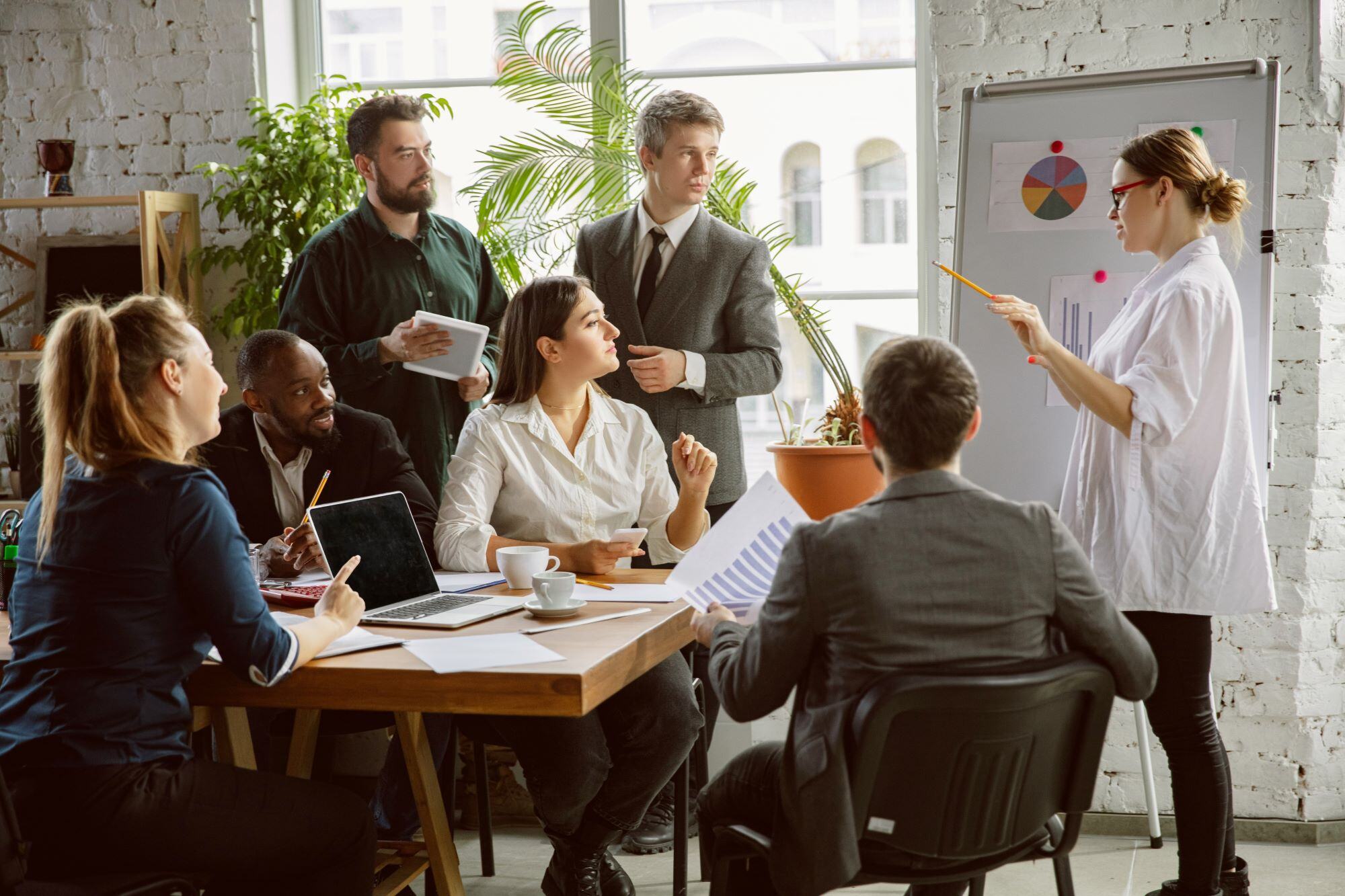 office workers reviewing payroll data