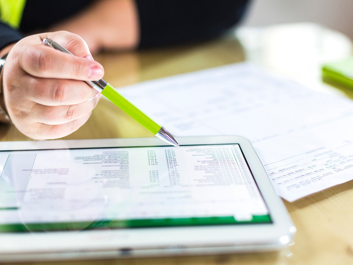 office workers reviewing payroll data