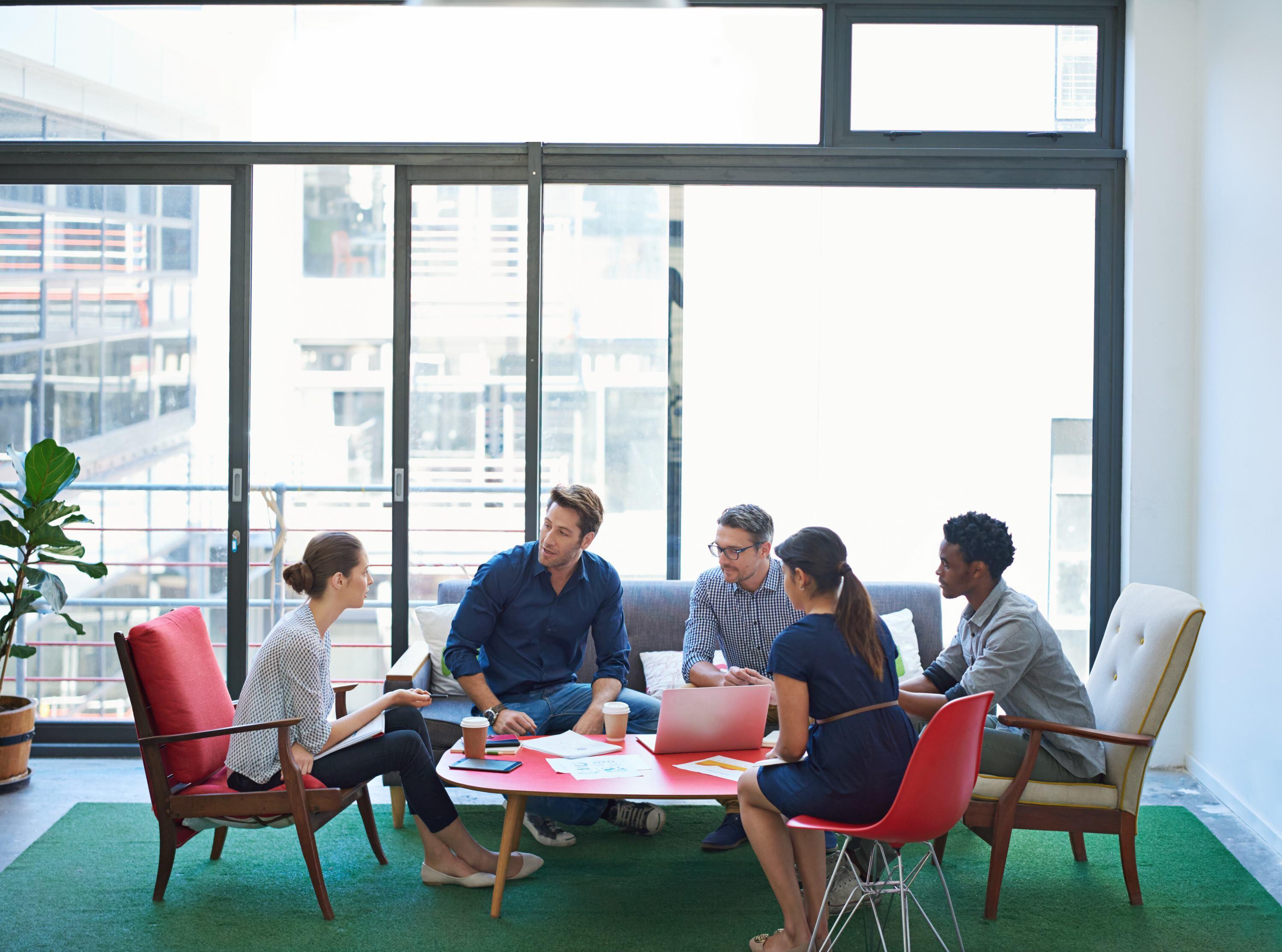 office workers reviewing payroll data