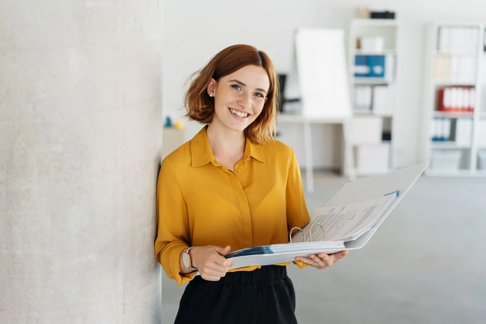 Woman holding folder