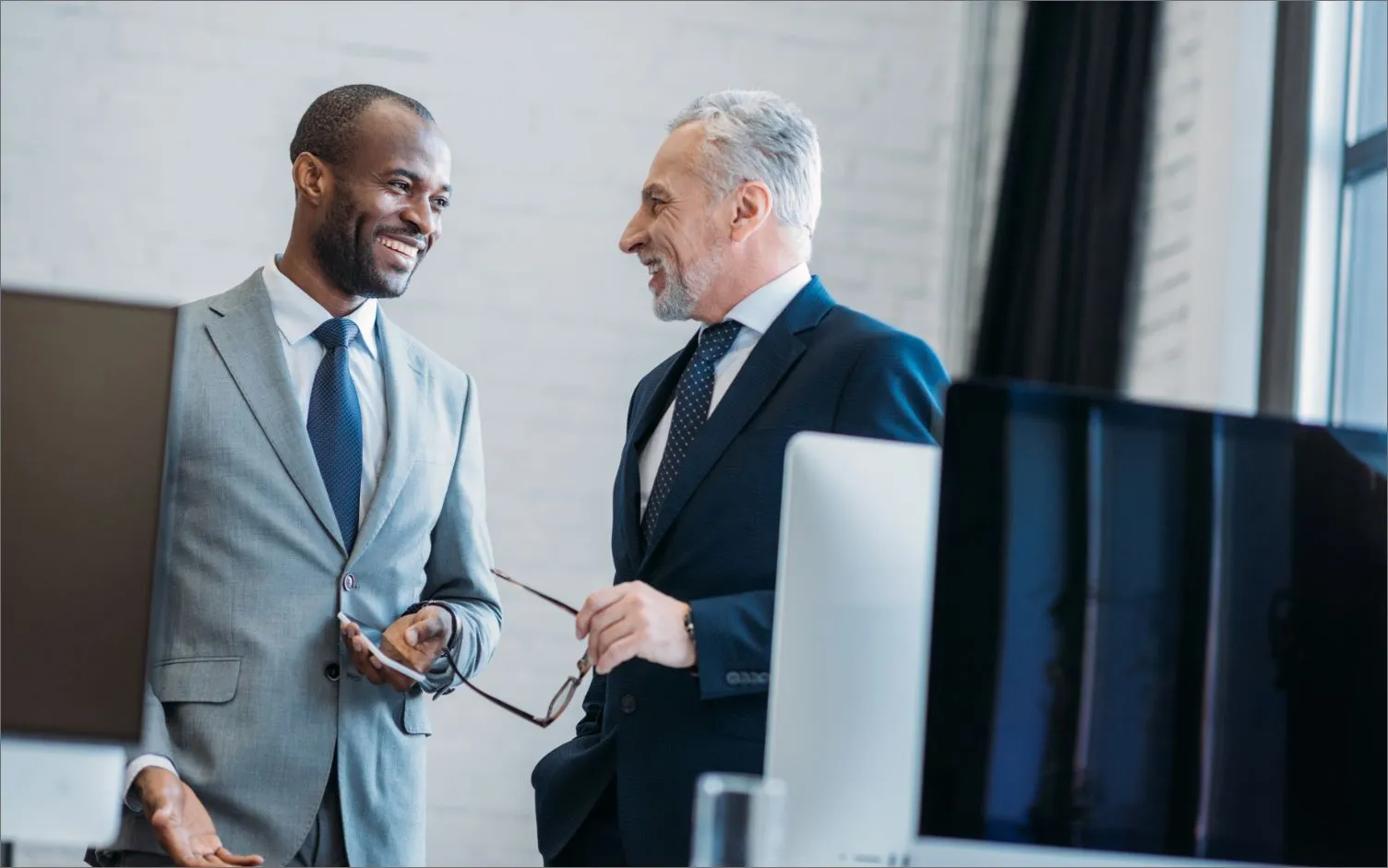 two men working in the office